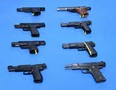 Eight of the handguns seized by RCMP. Photo courtesy of Alberta RCMP
