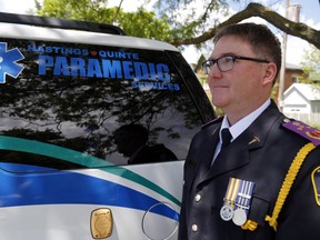 Hastings-Quinte Paramedic Services Chief Doug Socha, above on Wednesday outside Hastings County headquarters, said Ontario can ease pressure on the health care system by modernizing legislation to give hospitals and paramedic services more flexibility.