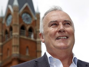 Former Belleville mayor and Bay of Quinte Liberal MP Neil Ellis stands outside city hall Thursday after filing the paperwork to be a mayoral candidate. He is the race's first challenger to incumbent Mitch Panciuk.