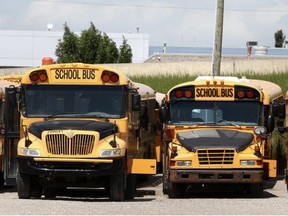 School buses stored at the First Student Canada lot on 6th Street N.E. in Calgary. JIM WELLS/Postmedia, file