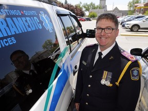 Chief Doug Socha, above June 8 at Hastings County headquarters in Belleville, says community paramedicine is helping to reduce some patients' trips to hospital by monitoring them in their homes and visiting them there as needed.