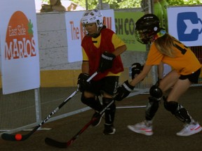 Charlie Webb, right, of the Comeback Kids, tries to steal the ball from McKile Larose of the Roadrunners at the inaugural Noah Strong Ball Hockey Tournament, Saturday, in Callander.
PJ Wilson/The Nugget