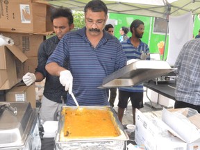 A vendor at the Northern Lights Festival in 2019 serves up some savoury Indian fare.