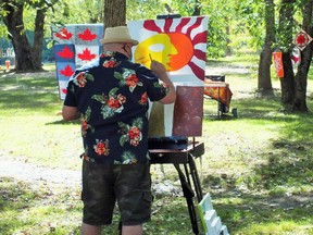 Outgoing organizer Jayson Stewart painting at the 2020 Art in the Park in Massey.