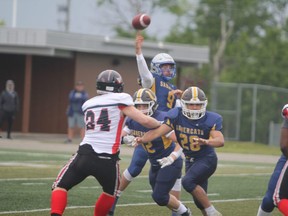 Sault Sabercats quarterback (#9) Gabe Barkley running back Michael Nicoletta (#28) in Ontario Summer Football League action at Superior Heights on June 11. Barkley and Nicoletta combined to score four touchdowns in the "Cats' 29-10 win over the Peterborough Wolverines on Saturday afternoon.