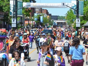 Crowds make their way along 2nd Avenue East during the Owen Sound Pride Parade on Saturday, June 18, 2022 in Owen Sound, Ont.