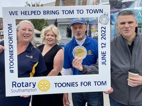 From left, Sylvia Sheard, Tracy Murray, executive director of the Saugeen Memorial Hospital Foundation, Tony Sheard, and James Scongack, co-chair of the Bring TOM to Town committee take part in the Southampton Rotary Club’s Toonies for TOM event June 12.
(Supplied)