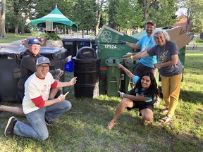 From left, John Brackenbury, Tom Brackenbury, volunteer coordinator Jill Glatt, SPAF waste diversion committee director Neil Bettney, and Sustainable Kingston’s Gaby Dee,  point to the only bin of garbage produced by the Skeleton Park Arts Festival on Sunday after its five-day run last week in McBurney Park, Kingston, Ont. (Supplied photo)