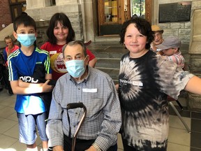 Handout/Cornwall Standard-Freeholder/Postmedia Network
Sandfield Place resident Tom Swift, centre, with Central Public School students Kayleigh, Jacob, and Ben, on the day earlier this month when residents visited their Central pen pals.