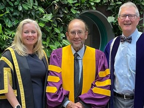 Handout/Cornwall Standard-Freeholder/Postmedia Network
Western University chancellor Linda Hasenfratz, left, with president Dr. Alan Shepard, right, and honorary doctorate recipient Dr. Robin Poole, on June 16, 2022, in London, Ont.