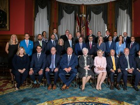 Ontario Premier Doug Ford unveiled his new cabinet Friday at Queen's Park after a swearing in ceremony. Bay of Quinte MPP Todd Smith will stay on this session as Minister of Energy.