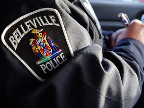 A Belleville police officer writes a ticket. City officers and those of other area police were among those enforcing traffic laws during the Safe on 62 blitz.