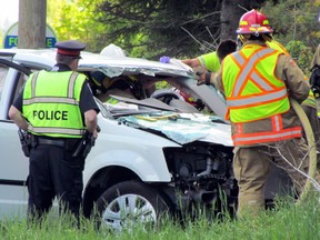 Reporting at scenes of serious car crashes, such as this two-vehicle collision the Sault Star’s Jeffrey Ougler covered at the intersection of Great Northern Road and Old Highway 17 in 2017, can leave a mark on journalists, who are expected not to intervene in events they are witnessing. JEFFREY OUGLER/THE SAULT STAR