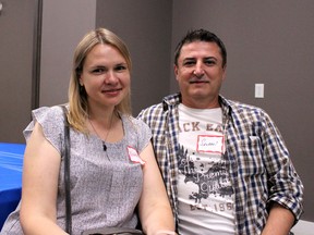 Nataliia Aykul (left) and her husband Selami escaped the war in Ukraine with their two children. Laura Beamish/Fort McMurray Today/Postmedia Network
