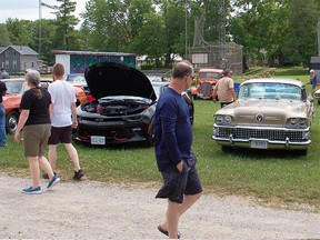 Car fans check out the entries at the Crime Stoppers of Grey Bruce car event held in Paisley June 26.
(Mary Lymburner)