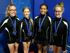 Jaelyn Roffel, left, Sawyer Schaafsma, Kyra Glassford-Bailey and Ava Roffel of the Blenheim-Kent Golden Eagles won medals at the 2022 Gymnastics Ontario provincial championships. Photo taken in Blenheim, Ont., on June 13, 2022. Mark Malone/Chatham Daily News/Postmedia Network