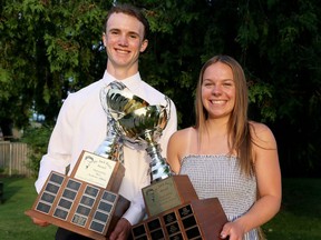 Chatham-Kent's Ayden Blain, left, and Blenheim's Anna Kistulinec win the Dr. Jack Parry Awards at Ursuline College Chatham in Chatham, Ont., on Tuesday, June 14, 2022. Mark Malone/Chatham Daily News/Postmedia Network