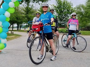 Desiree van Dijk with her friends, left to right, Stephan Sadikian, Marc and Erin Vacheresse, at the Ride Don't Hide cycling fundraiser Sunday, June 26, 2022 in Owen Sound, Ont. (Scott Dunn/The Sun Times/Postmedia Network)