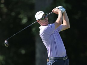 David Hearn of Canada plays his shot from the 13th tee during the first round of the John Deere Classic at TPC Deere Run on June 30, 2022 in Silvis, Illinois. (Photo by Dylan Buell/Getty Images)