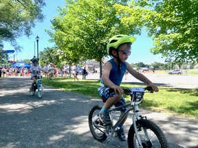 The 2015-2016 division of the Kingston Kids' Tri pedaled hard around the track at the Kingston Memorial Centre on Saturday. Sophia Coppolino/The Kingston Whig-Standard