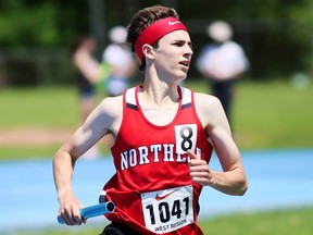 Ryan Davies of the Northern Vikings runs the anchor leg in the open boys' 4x400-metre relay at the OFSAA West Region track and field meet at Sandwich Secondary School in LaSalle, Ont., on Saturday, May 28, 2022. Mark Malone/Chatham Daily News/Postmedia Network