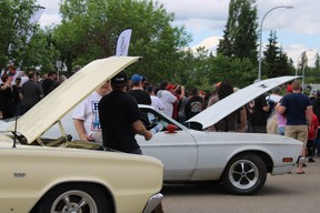 People attend Fort City Church’s father’s day car show in Fort McMurray, Alta. on Sunday, June 19, 2022. Vincent McDermott/Fort McMurray Today/Postmedia Network