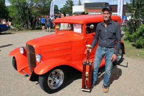 Nelson Moore and his People’s Choice Award stand next to Moore’s 1930 Ford Model A at Fort City Church’s father’s day car show in Fort McMurray, Alta. on Sunday, June 19, 2022. Vincent McDermott/Fort McMurray Today/Postmedia Network