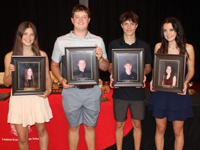 Olivia Grubb, left, Griffin Kelly, Blake Stevens and Maeve Cameron are Wall of Fame additions at Lambton-Kent Composite School. They were honoured at the Cardinals’ 2021-22 athletic awards ceremony, where Stevens and Cameron were named the most outstanding athletes of the year while Grubb and Kelly were chosen the most dedicated athletes. (Contributed Photo)
