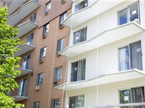 A child was in critical condition after falling at an apartment building at 301 Basel Line Rd. West in London on Thursday, June 9, 2022. It appears railings around most of the balconies have been removed for renovations. (Derek Ruttan/The London Free Press)