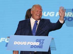 Doug Ford comes on stage at the Toronto Congress Centre to give his victory speech after winning a majority in the provincial election on June 2, 2022.