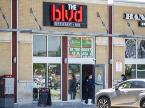 Durham Regional Police attending the scene after five people were injured and two people died following a shooting overnight in the parking lot of The BLVD restaurant and bar in Oshawa, Ont. on Saturday June 25, 2022. Ernest Doroszuk/Toronto Sun/Postmedia