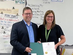 Laura Terpstra, a Grade 5 teacher at Upper Thames elementary school (UTES), received a platinum jubilee pin from Perth-Wellington MP John Nater June 17. The recognition was for "bravely leading her students through a devastating loss" this past school year, with the tragic drowning of Taleya Paris in March.