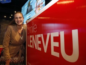 With Premier-elect Doug Ford giving a televised victory speech in the background, Bay of Quinte Liberal candidate Emilie Leneveu smiles at Shoeless Joe's restaurant in Belleville. She said she still felt "energized" despite her party's local and provincial losses.
