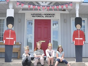 Celebrating all things Royal, The Asphodel Norwood Heritage Centre opened up last weekend for the first time in more than two years with a special exhibition to celebrate Queen Elizabeth's Platinum Jubilee. Besides the extensive display of artefacts and memorabilia there was also activities for young visitors to participate in as well, showing off their newly created crowns outside the uniquely decorated centre is from left Felix and Sylvia Gilbert and Olive and Adeline Hudson. The Historical Centre will be open this Saturday June 11 from 10 a.m. to 2 p.m. for one last chance to see their Royal display. JEFF DORNAN PHOTO
