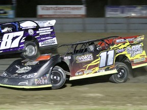 Kyle Sopaz (No.11) jumped to the first-place position very quickly and was not giving it up, determined to get the win and sail to victory lane for the first time this season during the Vanderlaan Building Products Late Model Feature Event on Saturday night at Brighton Speedway. Rod Henderson, CanadianRacer.com