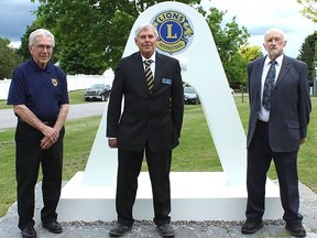 The Norwood Lion's Club recently commemorated seventy years of service to the community of Asphodel Norwood and beyond with the installation of a Lion's Friendship Arch along the entranceway to the community centre. The arch symbolizes the friendship between the club and their community. The Lions dedicated the arch to the memory of the thirty founding members who formed the club in 1952. Standing in front of the new monument (from left) is Lion Barry Patterson, Lion Rick Lochhead and Lion Ron Scott, each one is a descendant of an original founding member. DAVID MARSHALL PHOTO