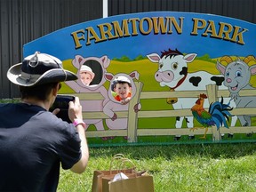 The Drury family travelled from Quinte West to the Kegs, Corks & Curds Festival in 2019 to enjoy a pleasant afternoon of family fun. Pictured here is Dad attempting to get the perfect shot of his kids. Dominic and Renato are posing playfully in one of the many distinctive photo-op cutouts in the kids' area of the festival. The family-friendly event returns to Farmtown Park this Saturday, June 25. TERRY VOLLUM PHOTO