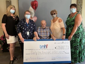 Howie Knapman, centre, and his wife Marilyn (Taffy) recently donated $25,000 to the Trenton Memorial Hospital Foundation. The longtime volunteers have done everything from selling raffle tickets, shredding documents, stuffing mailers or sitting at a Hole in One at the golf tournament. SUBMITTED PHOTO