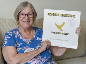 Karen George, who served as mayor of Brantford from 1987-91 holds an album autographed by Ronnie Hawkins. As a teenager, she would go to see Ronnie Hawkins and The Hawks perform every Sunday night at the Summer Gardens in Port Dover, almost 60 years ago.