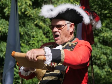 Brant town crier Larry Davis reads a proclamation shared by town criers across the Commonwealth at the county's Queen's Platinum Jubilee celebration Saturday at the Mount Pleasant Nature Park. CHRIS ABBOTT
