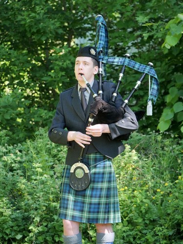 Ethan Leduc from the Paris Port Dover Pipe Band plays Diu Regnare at Brant County's Queen's Platinum Jubilee celebration Saturday at the Mount Pleasant Nature Park. CHRIS ABBOTT