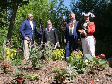 Speakers at Brant County's Queen's Platinum Jubilee celebration Saturday morning at the Mount Pleasant Nature Park, included Will Bouma (left), Brantford-Brant MPP-elect, Brant Mayor David Bailey, Brantford Mayor Kevin Davis and Brant town crier Larry Davis. They are standing near a new peace garden planted for the occasion. CHRIS ABBOTT