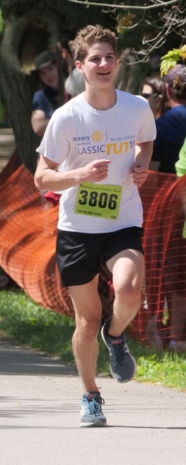 Simcoe's Andrew O'Neail was the first to cross the finish line for the five-kilometre race at Sunday's Brantford Rotary Classic Run. CHRIS ABBOTT