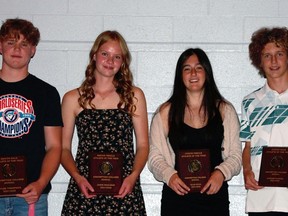 Assumption College recently held its annual athletic banquet. Major award winners included: Myles Thompson (left), senior boys athlete of the year; Josie MacLean, senior girls athlete of the year; Ellie Silva, junior girls athlete of the year; and Andrew McGarr, junior boys athlete of the year. Submitted