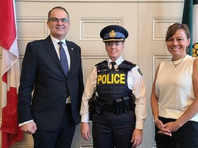George Santos, chair of the Norfolk police services board, and Norfolk County Mayor Kristal Chopp on Wednesday welcome OPP Insp. Jodi Kays to her new role as Norfolk police chief and detachment commander. Submitted
