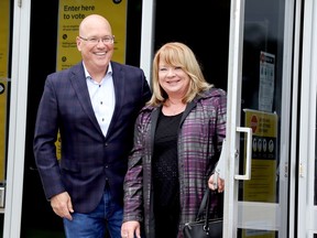 Leeds-Grenville-Thousand Islands and Rideau Lakes incumbent and Progressive Conservative candidate Steve Clark and his wife, Deanna, leave a Brockville polling station after voting in Thursday's provincial election. (RONALD ZAJAC/The Recorder and Times)
