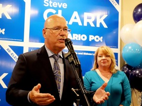 Re-elected Leeds-Grenville-Thousand Islands and Rideau Lakes MPP Steve Clark speaks to Progressive Conservative supporters while his wife, Deanna, looks on at a celebration at Luna Pizzeria on election night. (RONALD ZAJAC/The Recorder and Times)