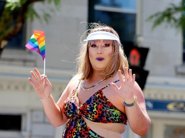 Brockville Pride chair Ryan Northrup, a.k.a. Ophelia Upp, waves to spectators dureing Brockville's eleventh annual Pride Parade on Saturday morning. (RONALD ZAJAC/The Recorder and Times)