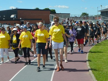 Cancer survivors lead the way at the opening of Relay for Life at Thousand Islands Secondary School in Brockville on Friday morning. It's the first in-person edition of the annual Canadian Cancer Society fundraiser in three years.
Tim Ruhnke/The Recorder and Times