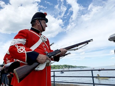 Jeff Shaver and fellow members of the Brockville Infantry Company greet the ships with a feu de joie,or celebratory musket fire. (RONALD ZAJAC/The Recorder and Times)